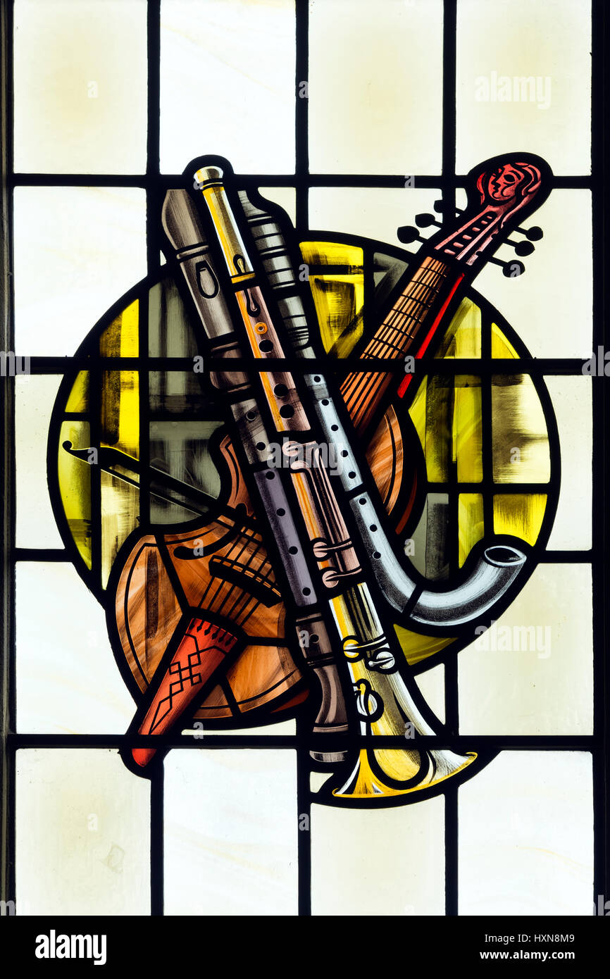 Teaching Adulthood Anesthetic Musical instruments stained glass, St Peter`s Church, March,  Cambridgeshire, England, UK Stock Photo - Alamy