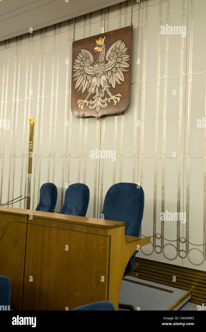 The three seats are for the two Vice-Marchals and the Marshall of the Senate sits during Senate meeting in the Polish Senate at the Polish Parliament  Stock Photo