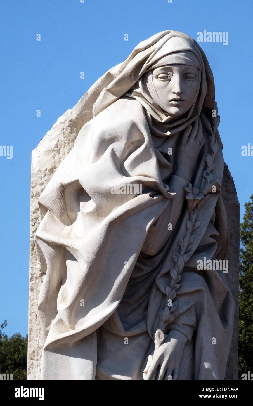 Statue of Saint Catherine of Siena near Sant Angelo Castle in Rome