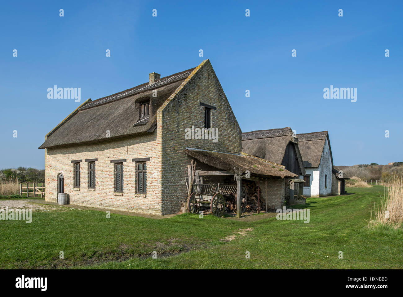 Reconstructed 15th century fishermen cottages of medieval fishing village Walraversijde, open-air museum at Raversijde, West Flanders, Belgium Stock Photo