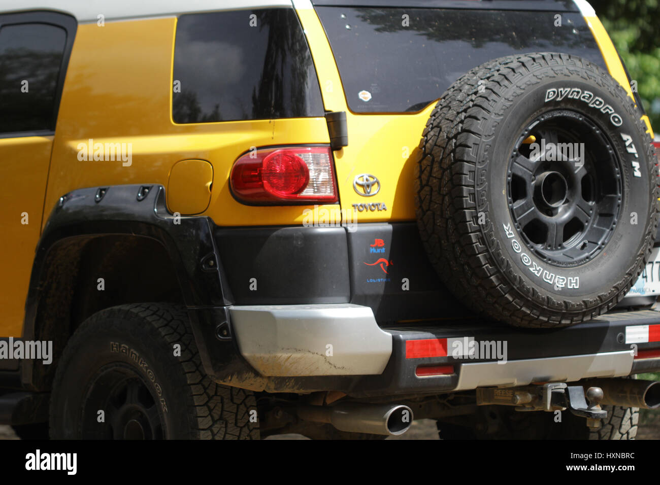Yellow jeep parked in the fields Stock Photo Alamy