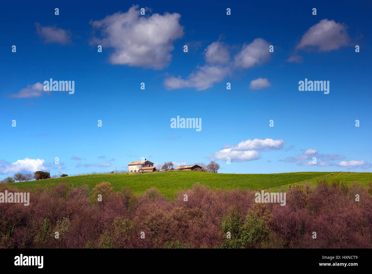 Farm House On The Prairie Country House On The Hill And Background Of Blue Sky And Clouds Stock Photo Alamy