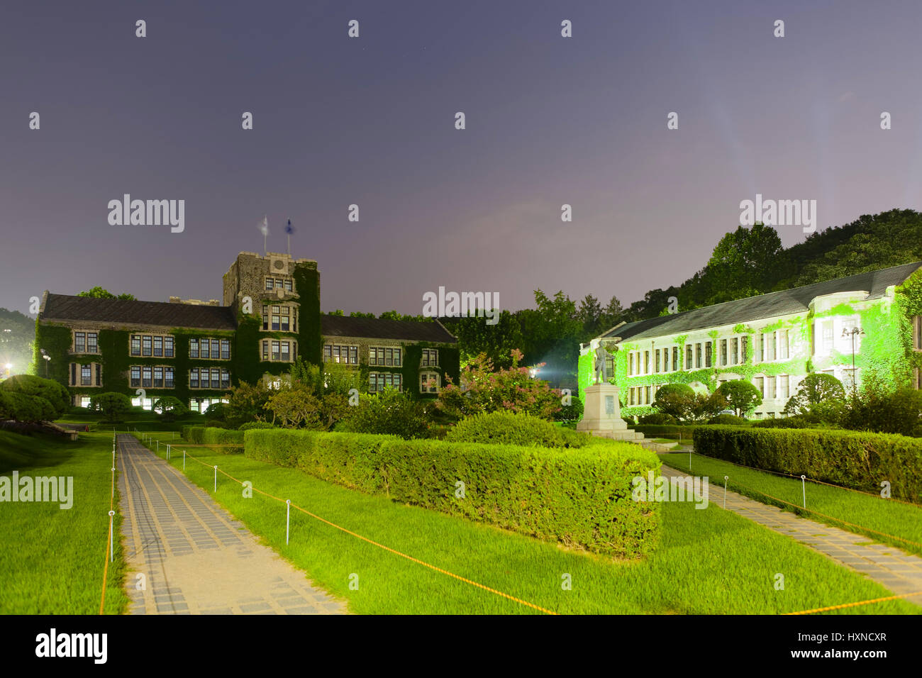 Night shot of historical and administrative building of prestigious ...