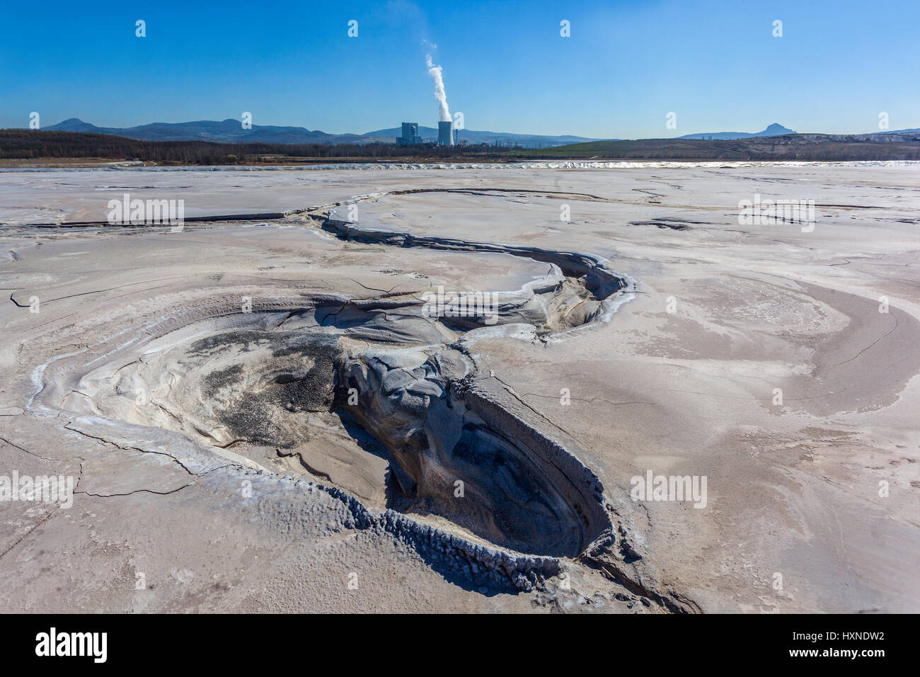 Sediment bowls. A byproduct of coal mining is pollution nature and landscape. Ledvice power plant, Czech Republic, Europe thermal coal mining Stock Photo