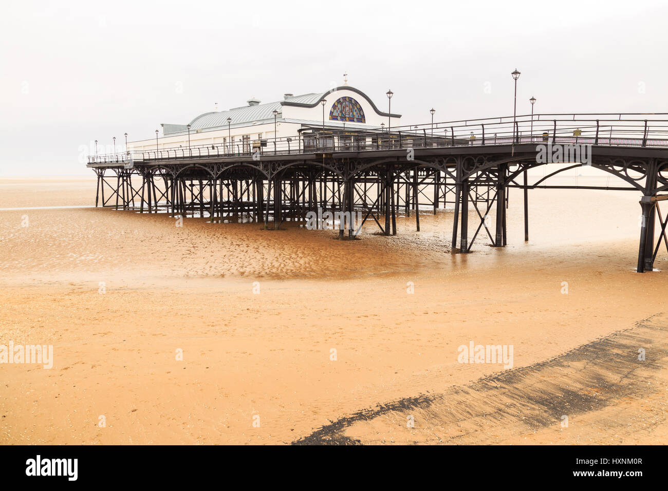 CLEETHORPES, ENGLAND - MARCH 14: Cleethorpes beach, sea and pleasure pier without people. In Cleethorpes, England. On 14th March 2017. Stock Photo