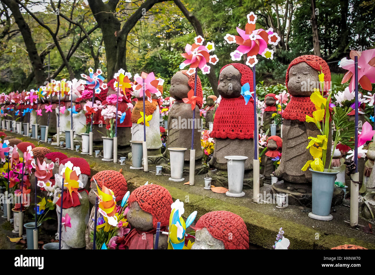 Jizo statues at the cemetery of Zojoji temple, Tokyo, Japan Stock