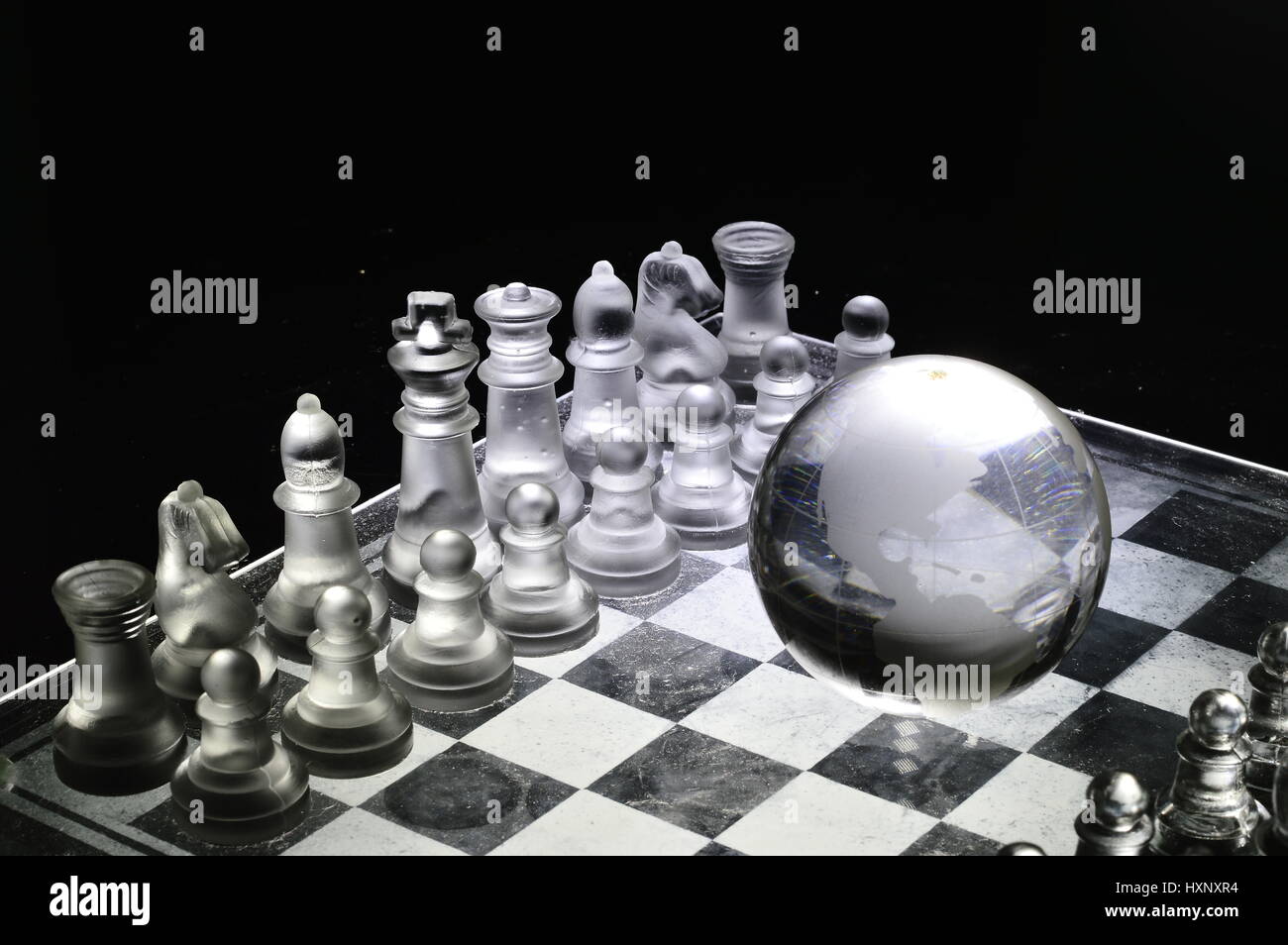 Chess pieces on a chessboard, the game ready to start Stock Photo