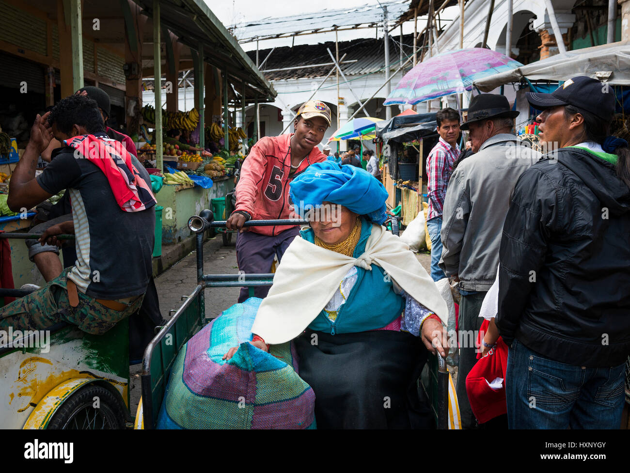 Otavalo, Ecuador - February 1, 2014: People in a market in the town of Otavalo in Ecuador. Stock Photo