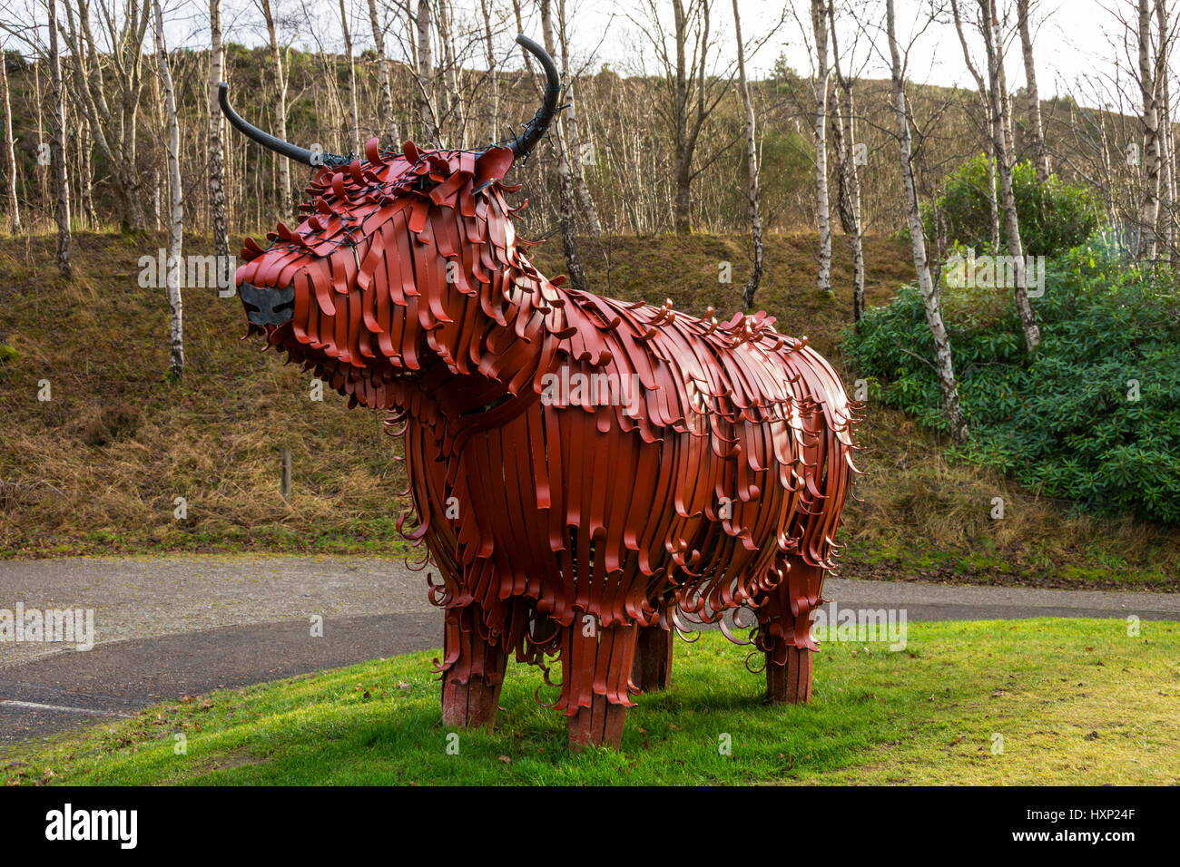 'Fergus the Hairy Coo', a sculpture by Kev Paxton, at the Ralia Cafe, near Newtonmore., Highland Region, Scotland, UK Stock Photo