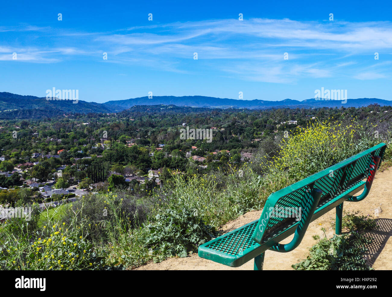 Bench with a sweeping view of Ojai on the Shelf Road Trail in California Stock Photo