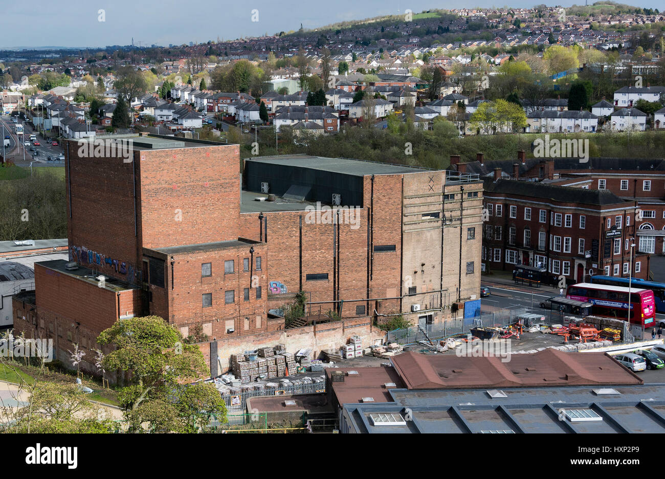 View of the old Plaza Cinema and the Station Hotel with Kate's Hill council estate in the distance. Dudley, West Midlands, UK Stock Photo