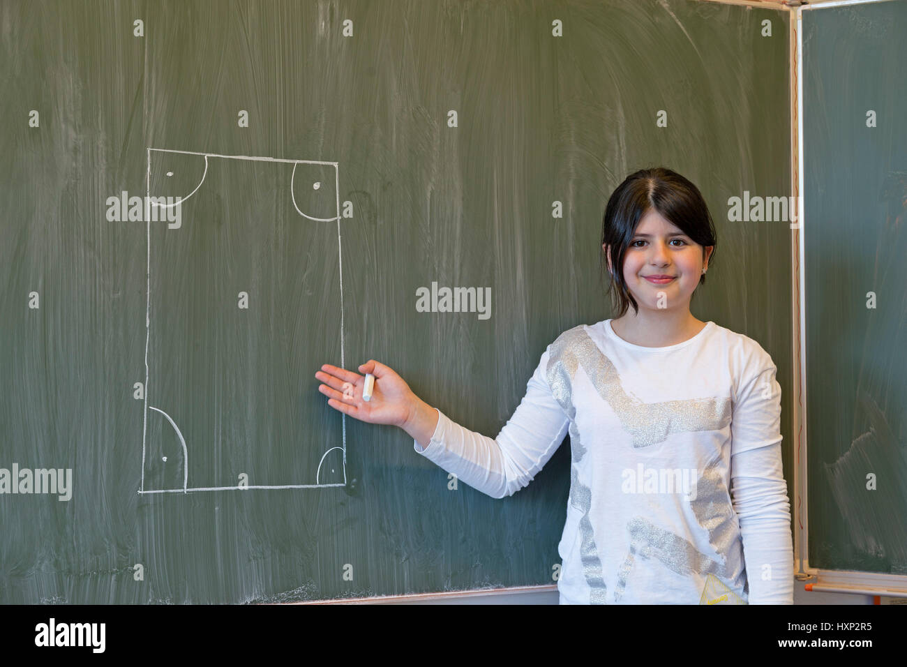 girl doing German grammar at primary school Stock Photo