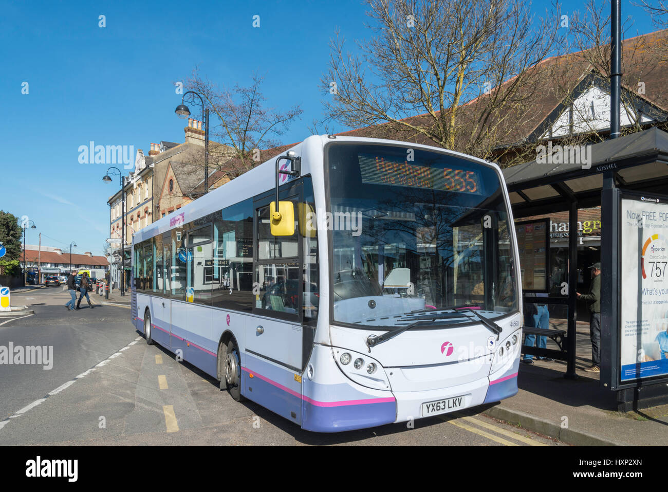 Local bus service, The Green, Hersham, Surrey, England, United Kingdom Stock Photo
