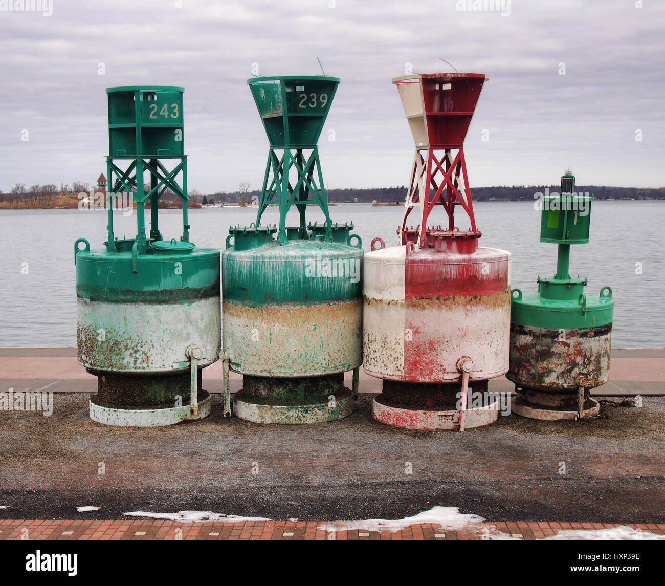 Navigational buoys docked on the shore of The Saint Lawrence River Stock Photo
