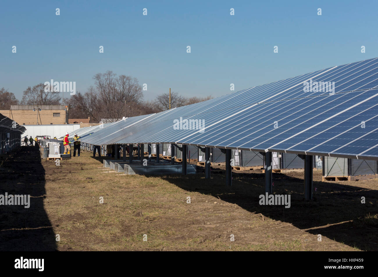 Detroit, Michigan Workers build a 2 megawatt solar installation for