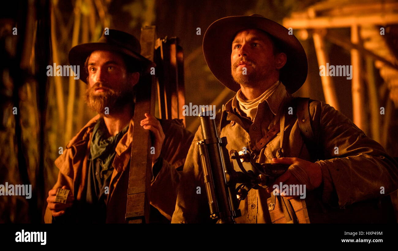 RELEASE DATE: April 14, 2017 TITLE: The Lost City Of Z STUDIO: Amazon Studios DIRECTOR: James Gray PLOT: A true-life drama, centering on British explorer Col. Percival Fawcett, who disappeared while searching for a mysterious city in the Amazon in the 1920s STARRING: Charlie Hunnam as Percy Fawcett, Robert Pattinson as Henry Costin (Credit: © Amazon Studios/Entertainment Pictures/ZUMAPRESS.com) Stock Photo