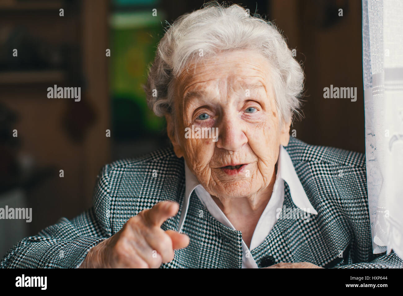 Woman sitting chair talk hi-res stock photography and images - Alamy