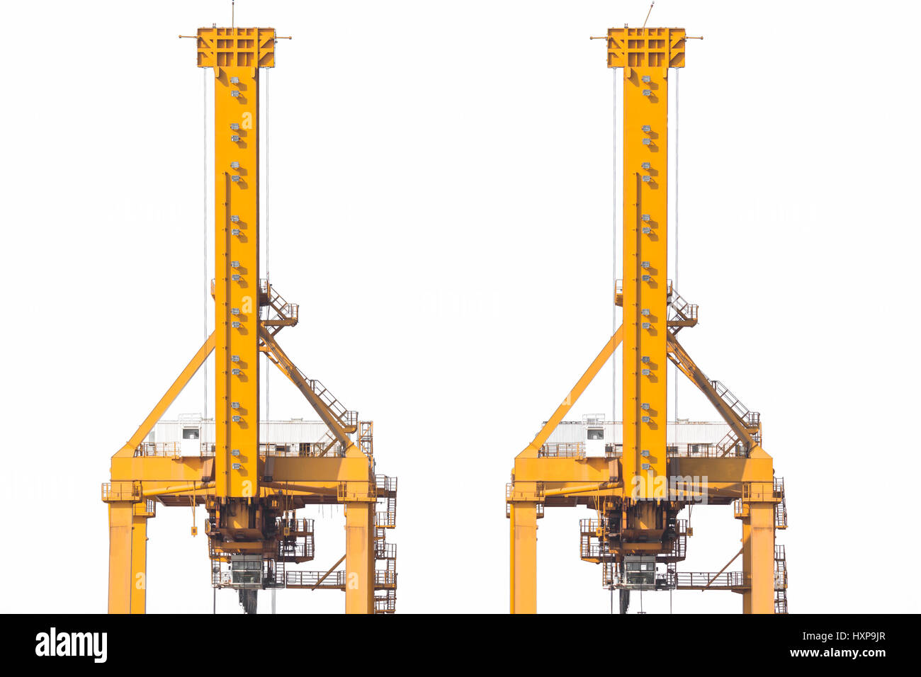 Yellow harbor cranes in shipyard isolate on white background Stock Photo