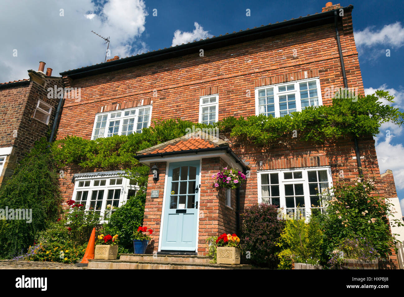 Houses on Levenside, River Leven, Stokesley, North Yorkshire, England
