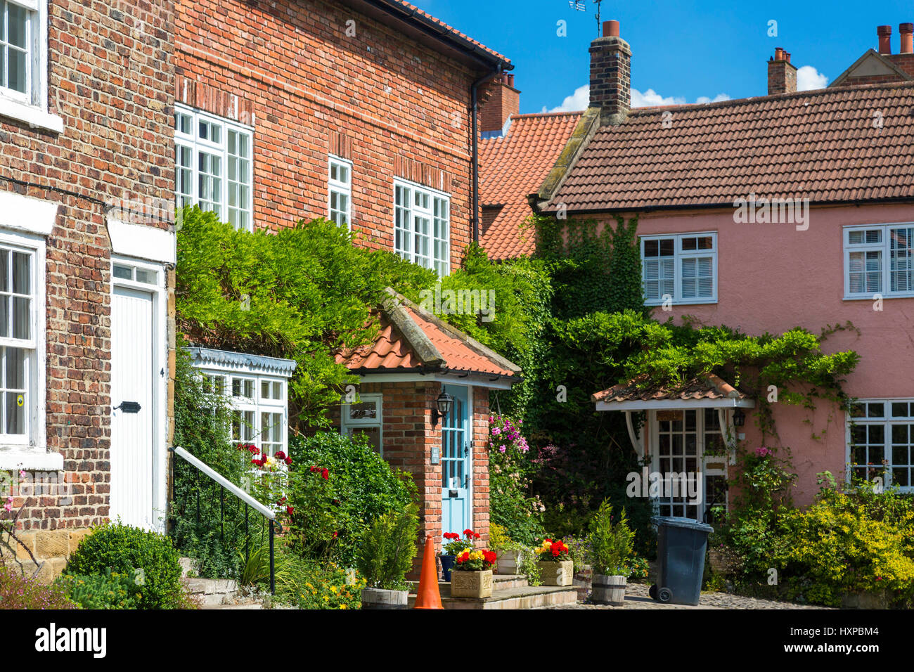 Houses on Levenside, River Leven, Stokesley, North Yorkshire, England