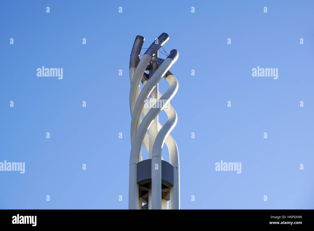 Structural detail of iron and steel curving roof of fantastic office building. Modern and Contemporary architectural fiction with glass steel column.Abstract architecture fragment. Stock Photo