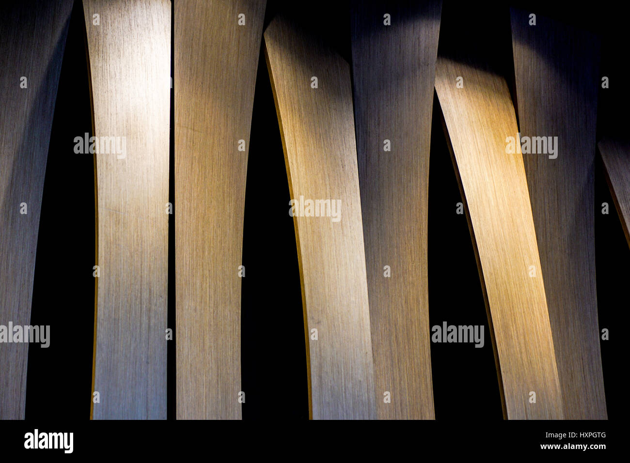 Grunge interior photo of wood wall with lateral lighting from led light . Abstract architecture image in classic style with contrast Stock Photo