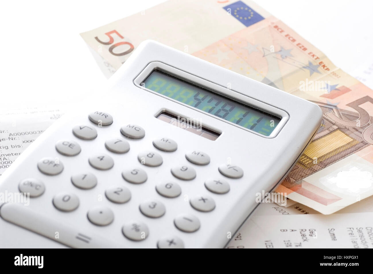 Pocket calculator, cash document and eurolight (no Pr), Taschenrechner, Kassenbeleg und Euroschein (no pr) Stock Photo