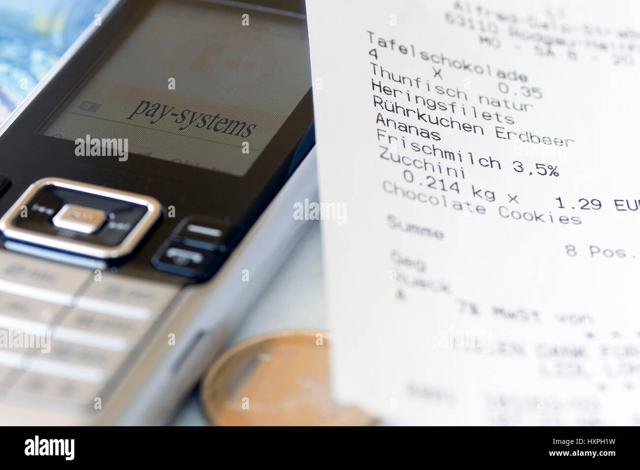 Mobile phone with receipt (no Pr), Handy mit Kassenbon (no pr) Stock Photo