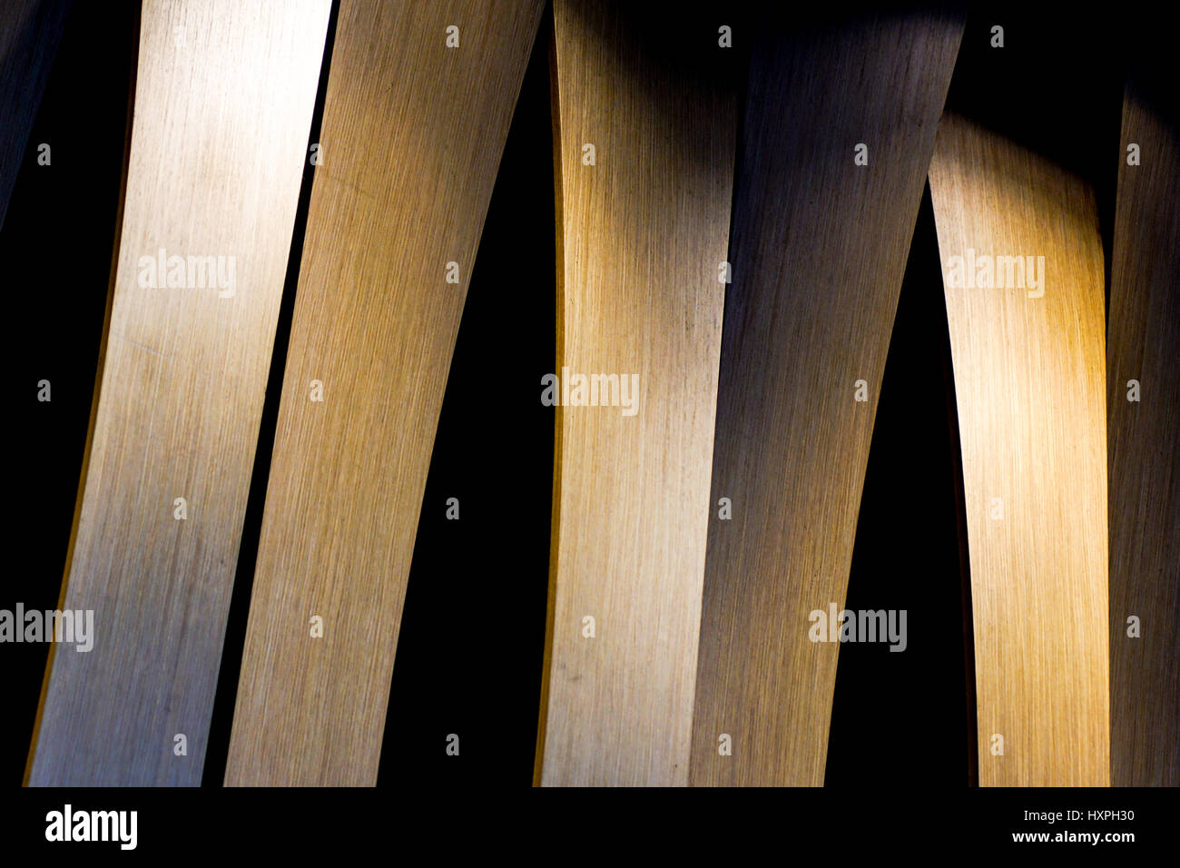 Grunge interior photo of wood wall with lateral lighting from led light . Abstract architecture image in classic style with contrast Stock Photo
