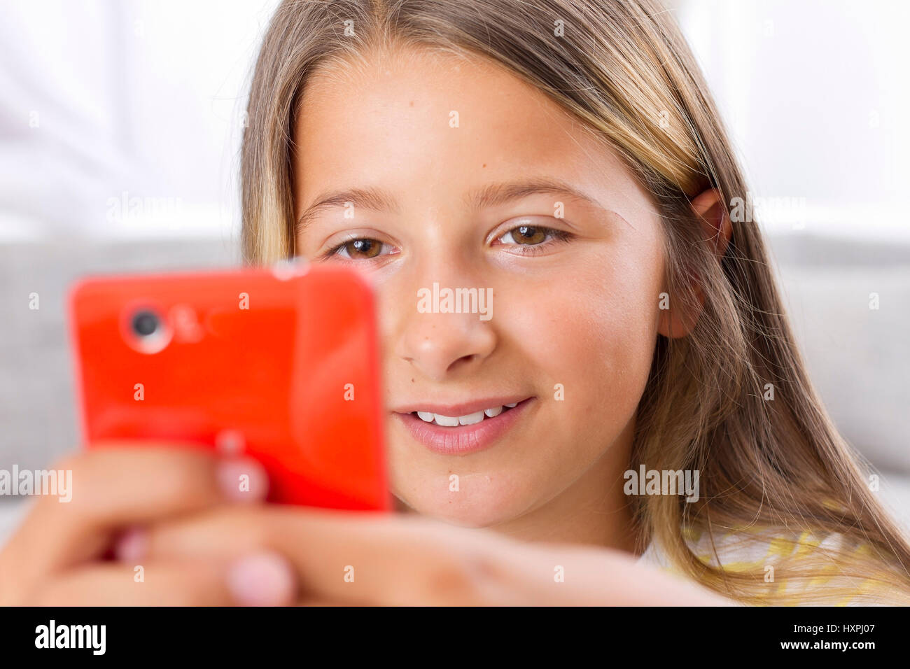 Youngster with smartphone, Jugendliche mit Smartphone Stock Photo