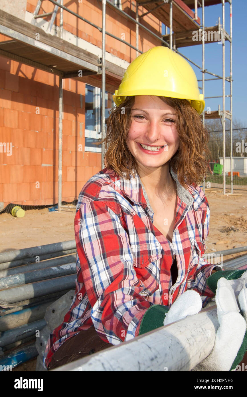 Woman as a construction worker, Frau als Bauarbeiterin Stock Photo
