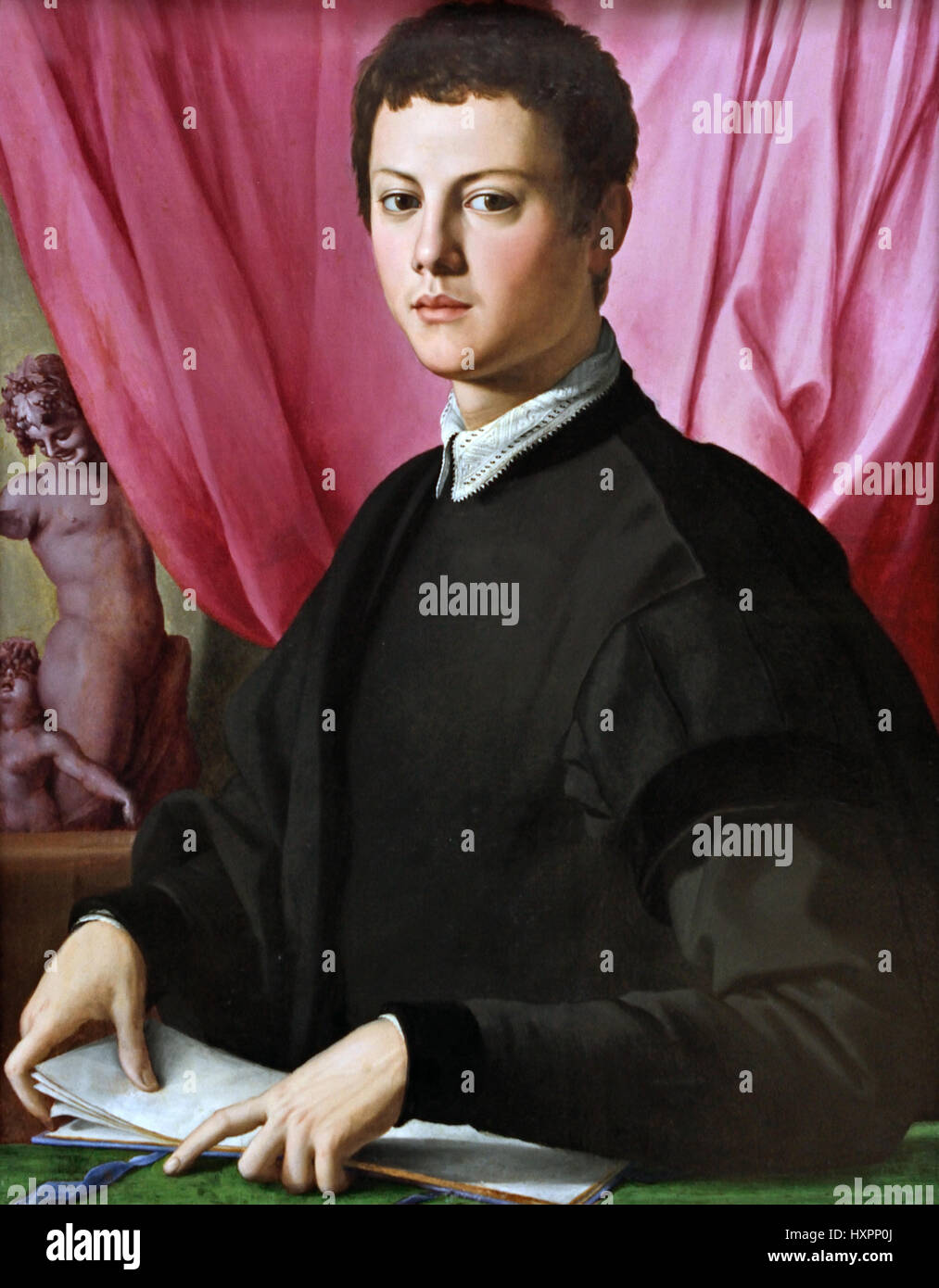 Portrait of a young man 1550 Agnolo di Cosimo 1503 –1572 known as Bronzino Italian, Italy, (  Bronzino himself composed verses in the style of the great Florentine poet Petrarch (1304–74) ) Agnolo di Cosimo, said, il Bronzino, 1503-1752 Stock Photo