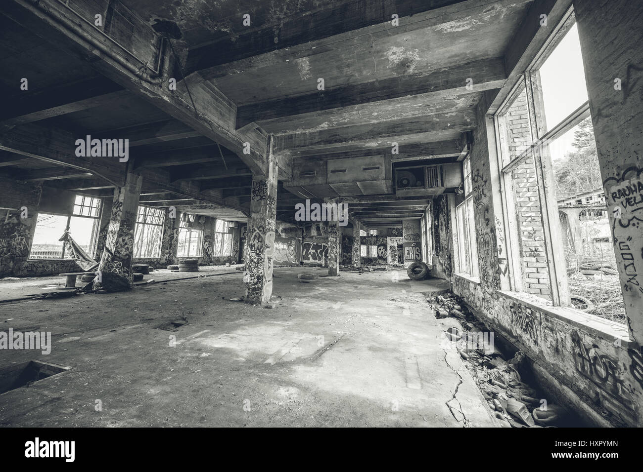 Big empty room in old abandoned factory building Stock Photo