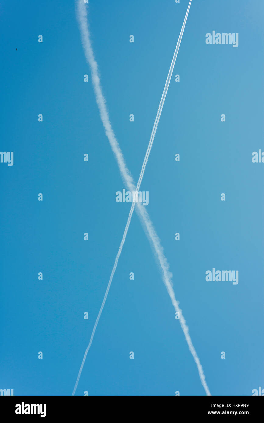 Jet contrails in the sky Stock Photo Alamy