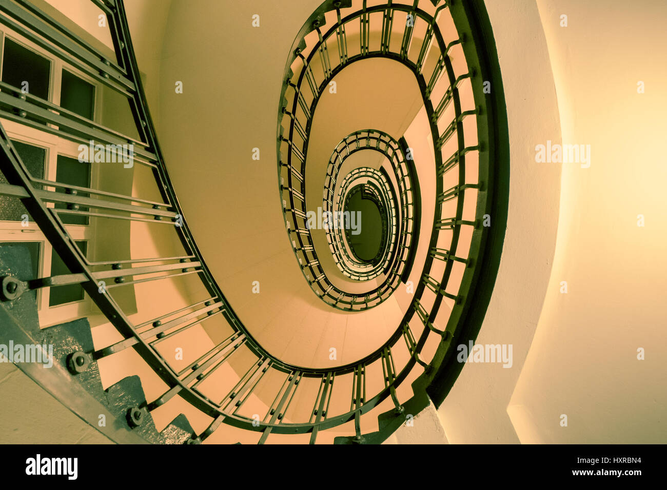 Vintage spiral Staircase in a multiple family dwelling Stock Photo