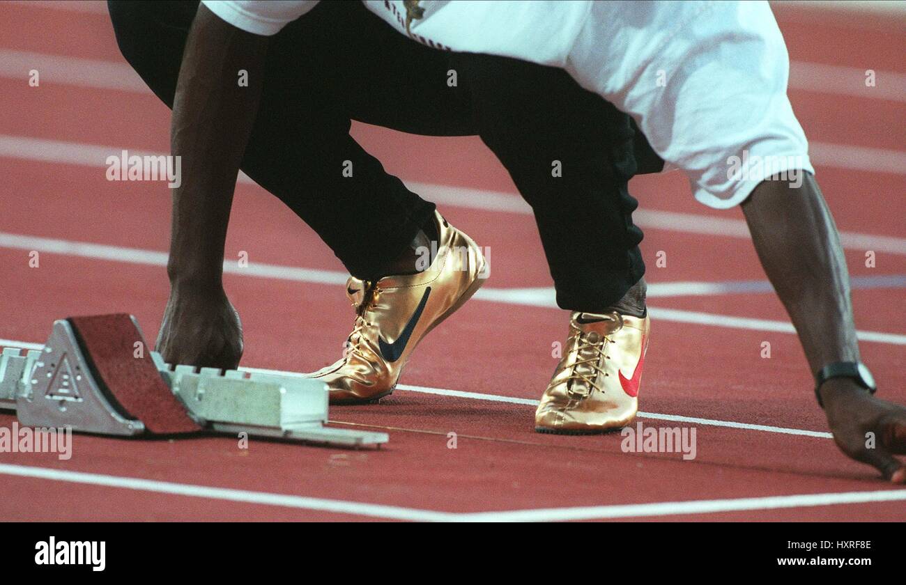 MICHAEL JOHNSON WITH GOLD NIKE SHOES. 01 August 1996 Stock Photo - Alamy