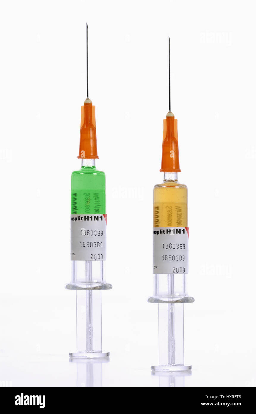Different vaccines against the pork influenza in two syringes, Unterschiedliche Impfstoffe gegen die Schweinegrippe in zwei Spritzen Stock Photo