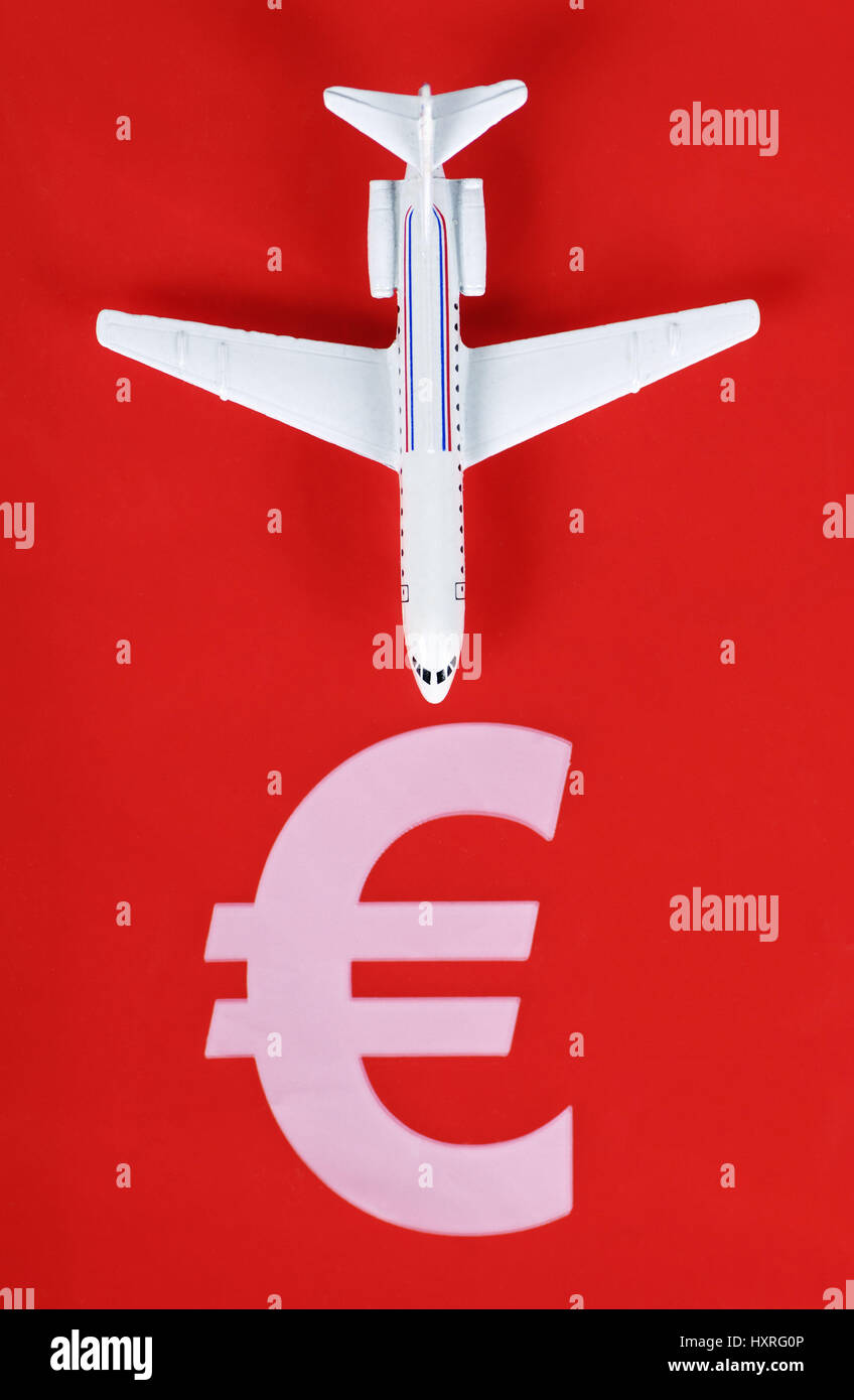 Miniature airplane and euro-sign, cheap Airlines, Miniaturflugzeug und Euro-Zeichen, Billig-Airlines Stock Photo