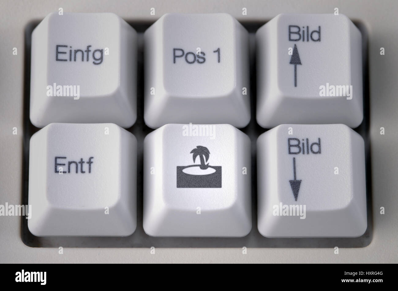 Computer keyboard with symbol of an island, trips, trips, on-line, book, Internet, travel agencies, travel agency, in, symbol, symbols, island, holida Stock Photo