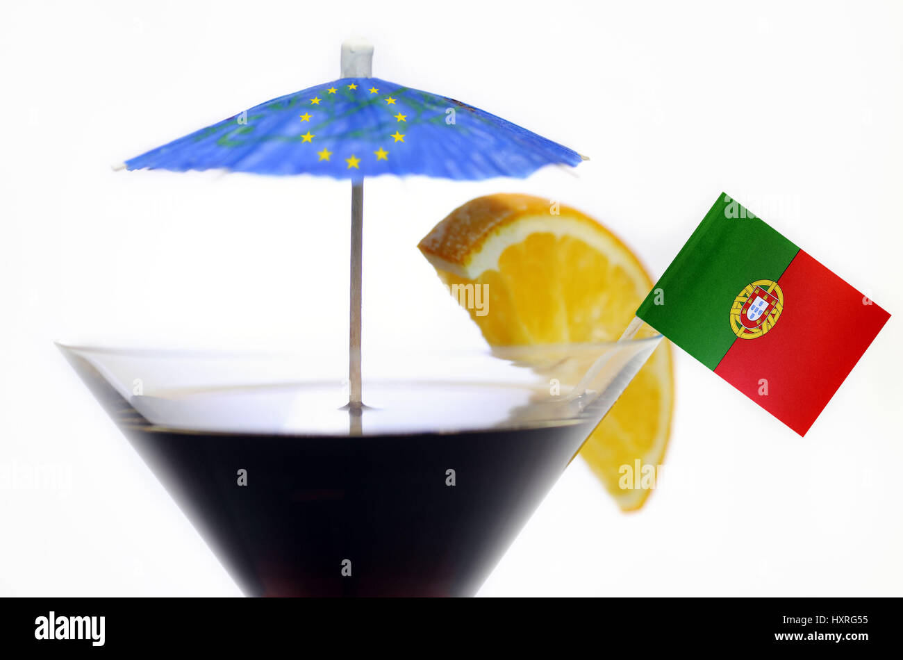 Cocktail glass with EU-rescue screen and Portugal flag, Cocktailglas mit EU-Rettungsschirm und Portugal-Fahne Stock Photo
