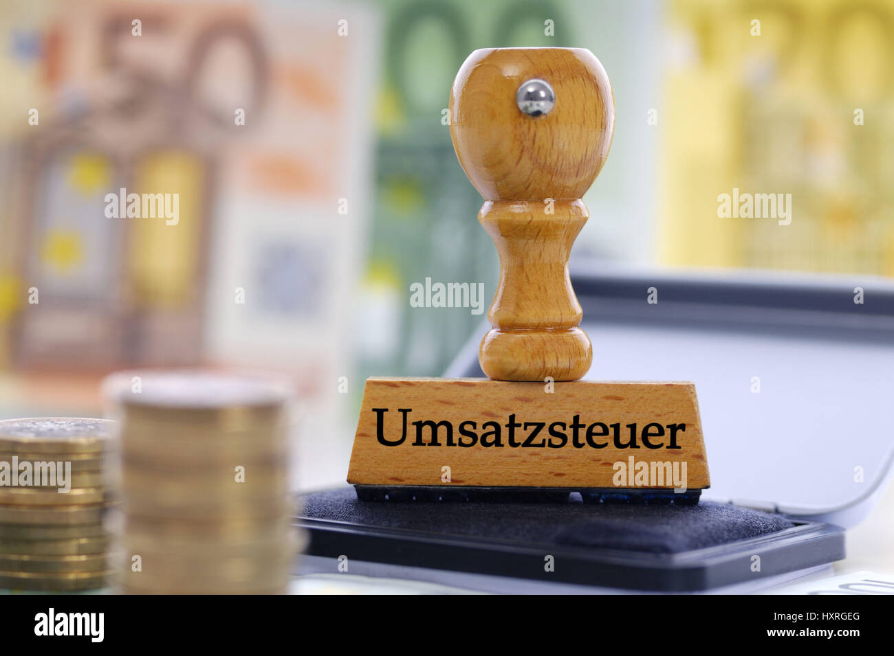 Stamp with the label Sales tax, Stempel mit der Aufschrift Umsatzsteuer Stock Photo