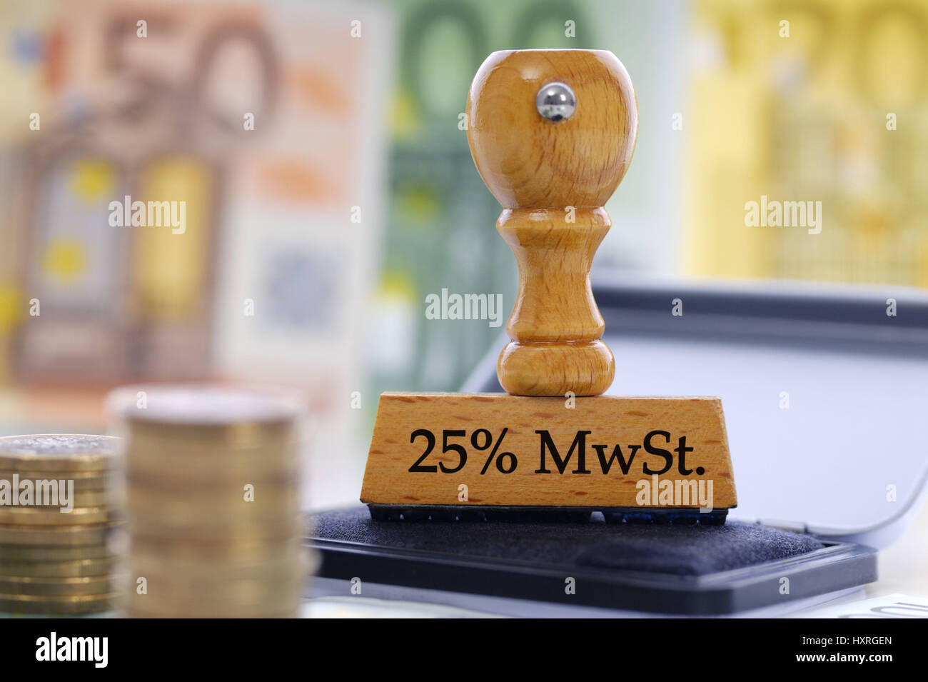 Stamp with the label 25% of VAT, value added tax rise, Stempel mit der Aufschrift 25% MwSt., Mehrwertsteuererhöhung Stock Photo