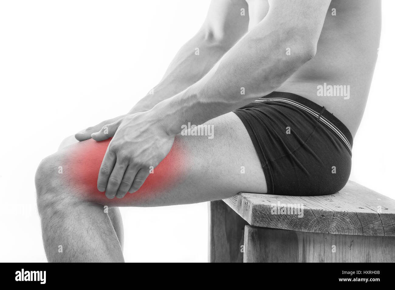 Man with leg pain over white background Stock Photo Alamy