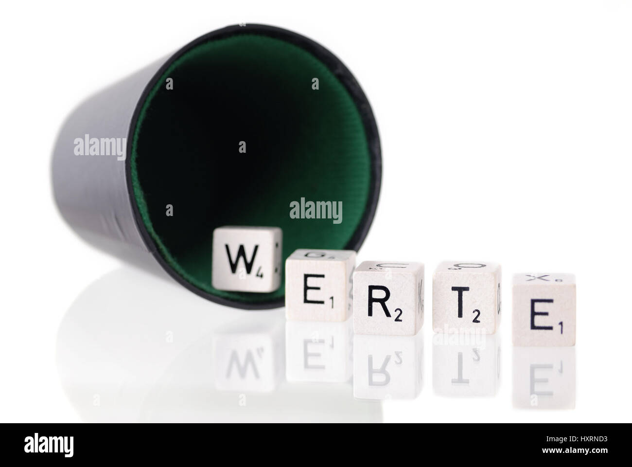 Dice cup with letter cube, stroke values, Würfelbecher mit Buchstabenwürfel, Schriftzug Werte Stock Photo