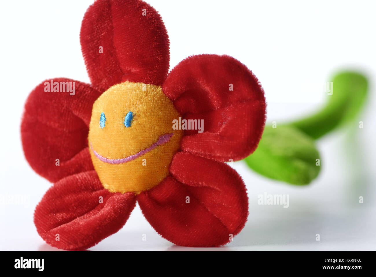 Material flower with Smiley, Stoffblume mit Smiley Stock Photo - Alamy