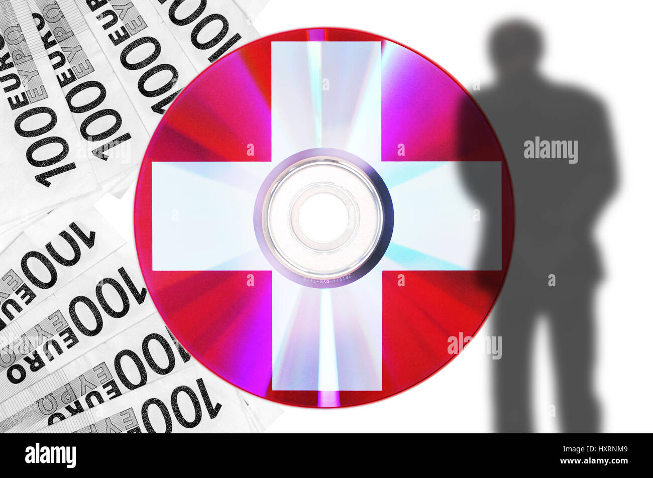 CD with Swiss bank data, shades of a businessman and black money, CD mit Schweizer Bankdaten, Schatten eines Geschäftsmannes und Schwarzgeld Stock Photo