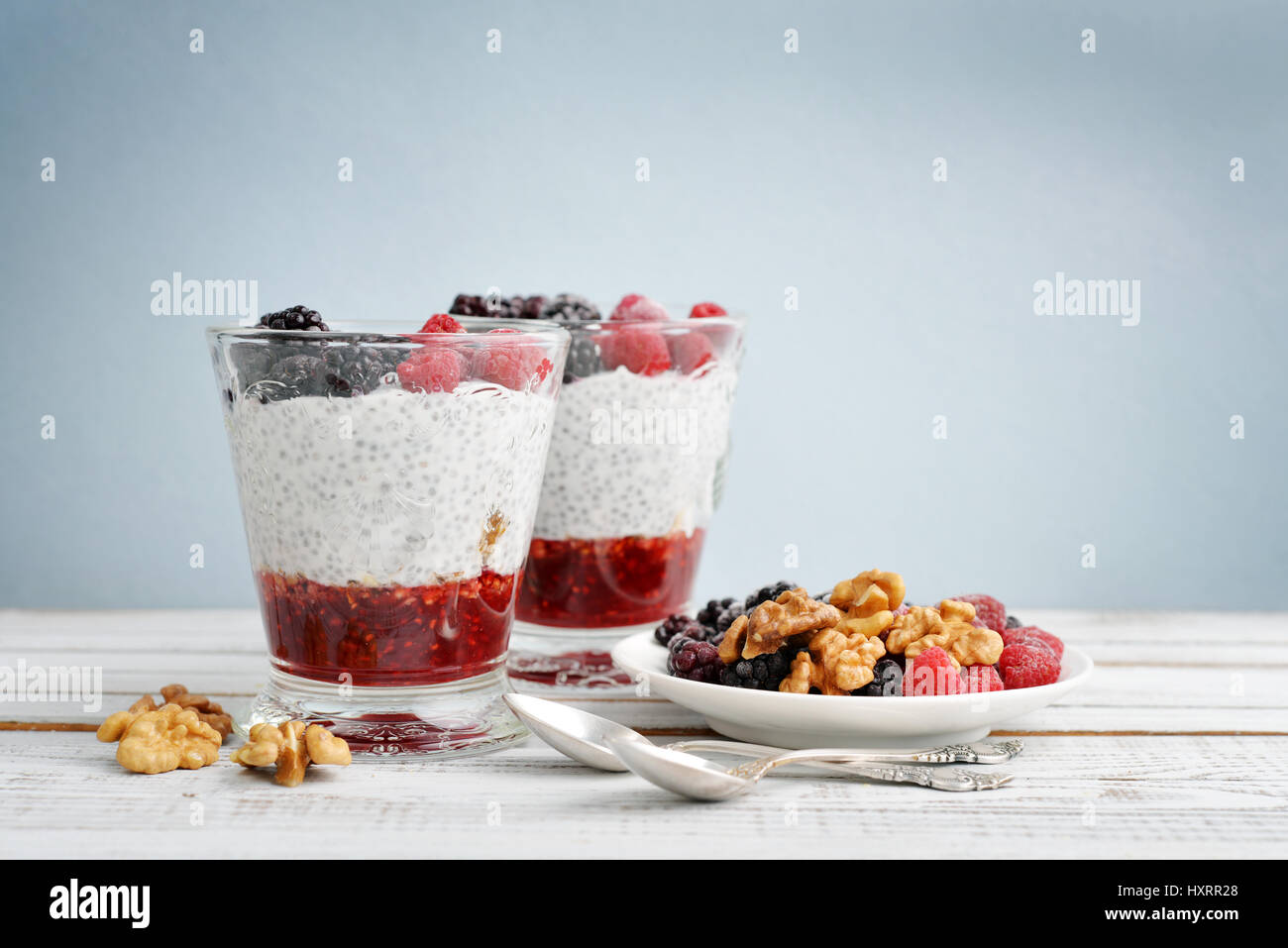 Pudding with chia seeds, yogurt and frozen berries in glass Stock ...