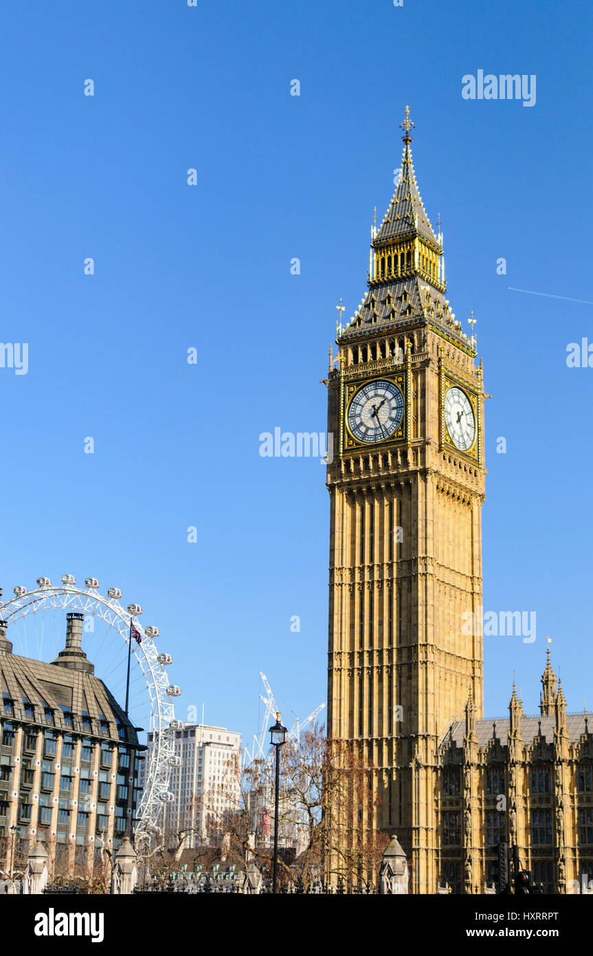 The Elizabeth Tower aka Big Ben on a sunny day with the London eye in the background. London, England 2017. Stock Photo