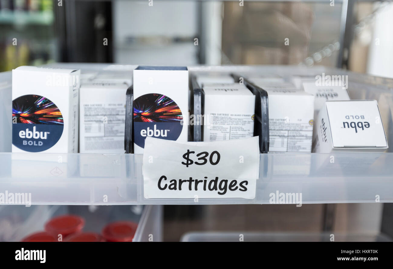 boxes of Ebbu brand cannabis vape pen cartridges on the shelf of a dispensary Stock Photo