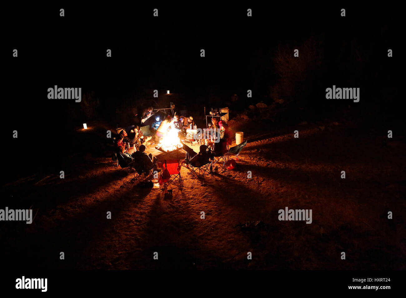 People around a campfire in Grand Canyon National Park, Arizona, United States. Stock Photo